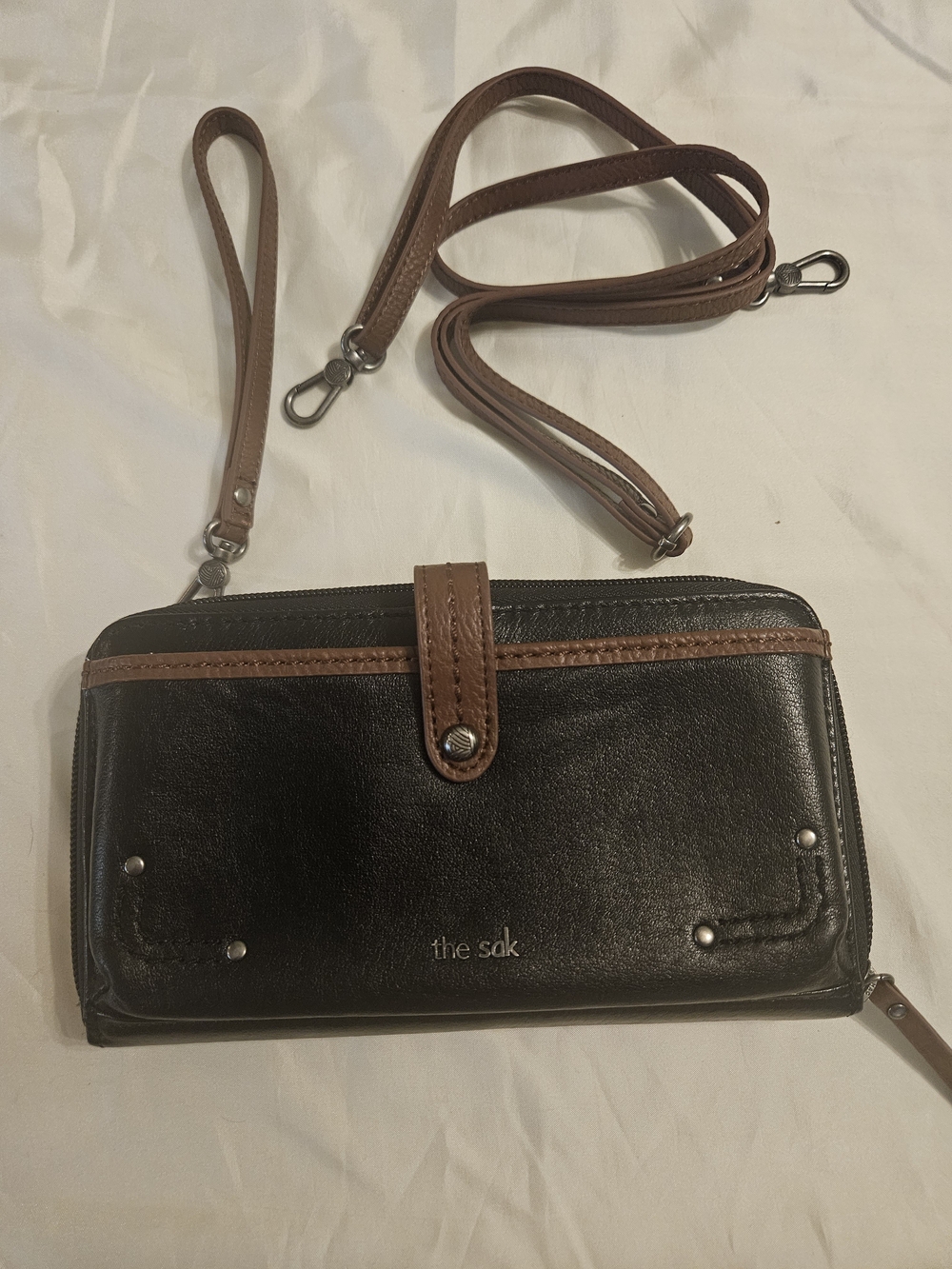 The Sak Black and Brown Convertible Crossbody Wallet